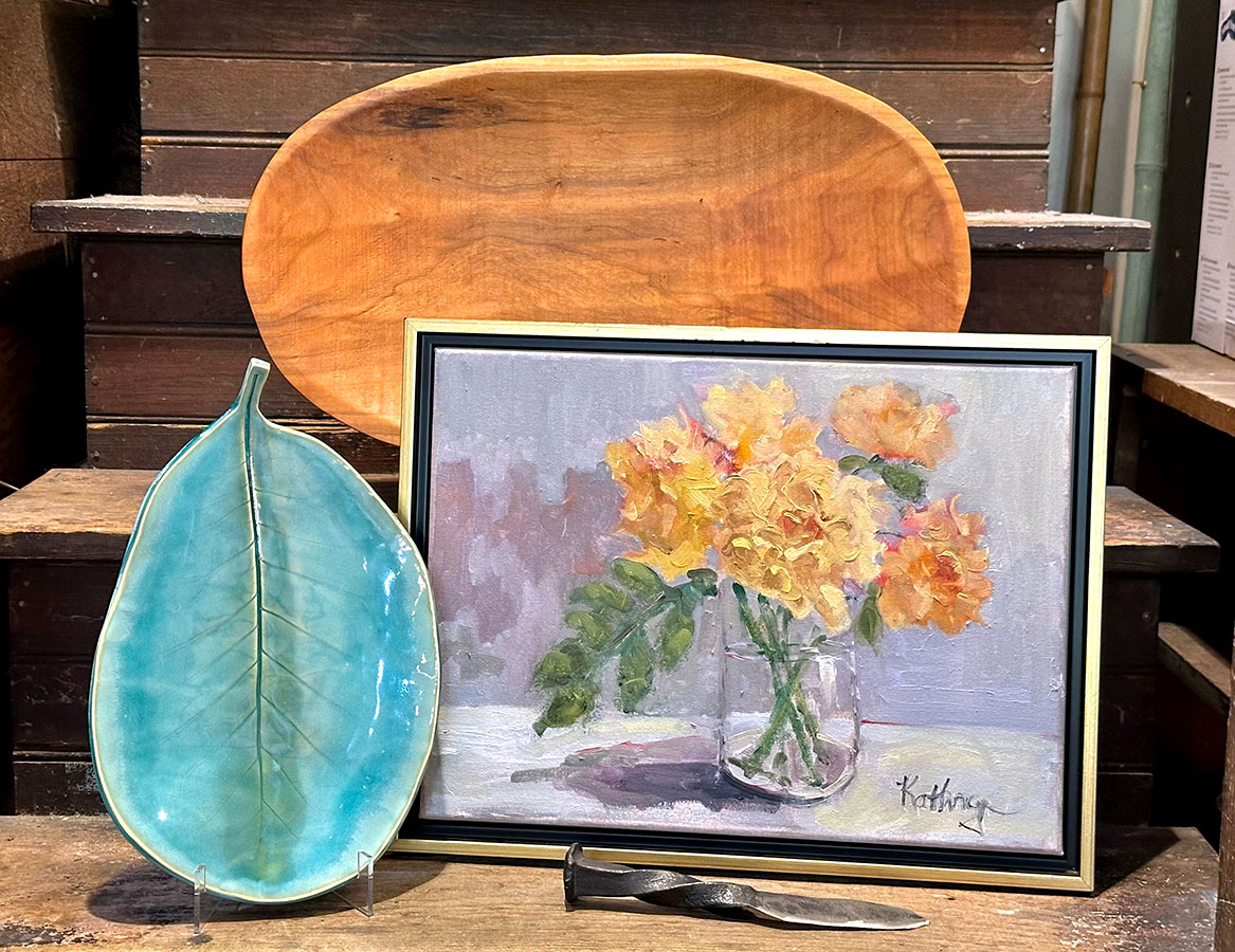 We specialize in local and regional arts and fine crafts. Our selection includes painting, pottery, textiles, jewelry, carved wood, soaps, and forged metal.  
